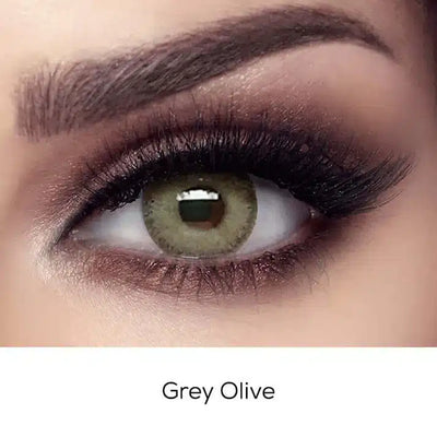 Close-up of an eye wearing Bella Elite Grey Olive colour contact lens